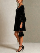 Black Velvet Button-front Mini Dress Featuring Striking Floral Cuffs
